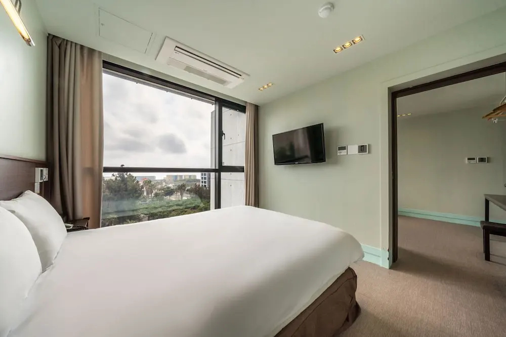 Sunrise Hotel Jungmun - Chambres