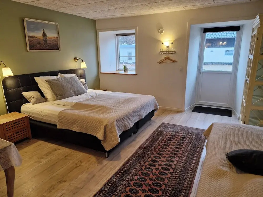 Deluxe Triple room with courtyard view