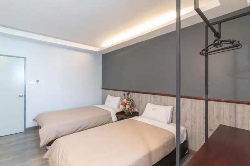 Luck Thai Hotel - Chambres