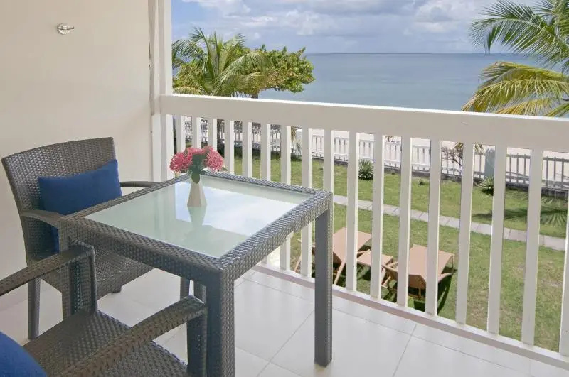 Standard room with balcony and beachfront