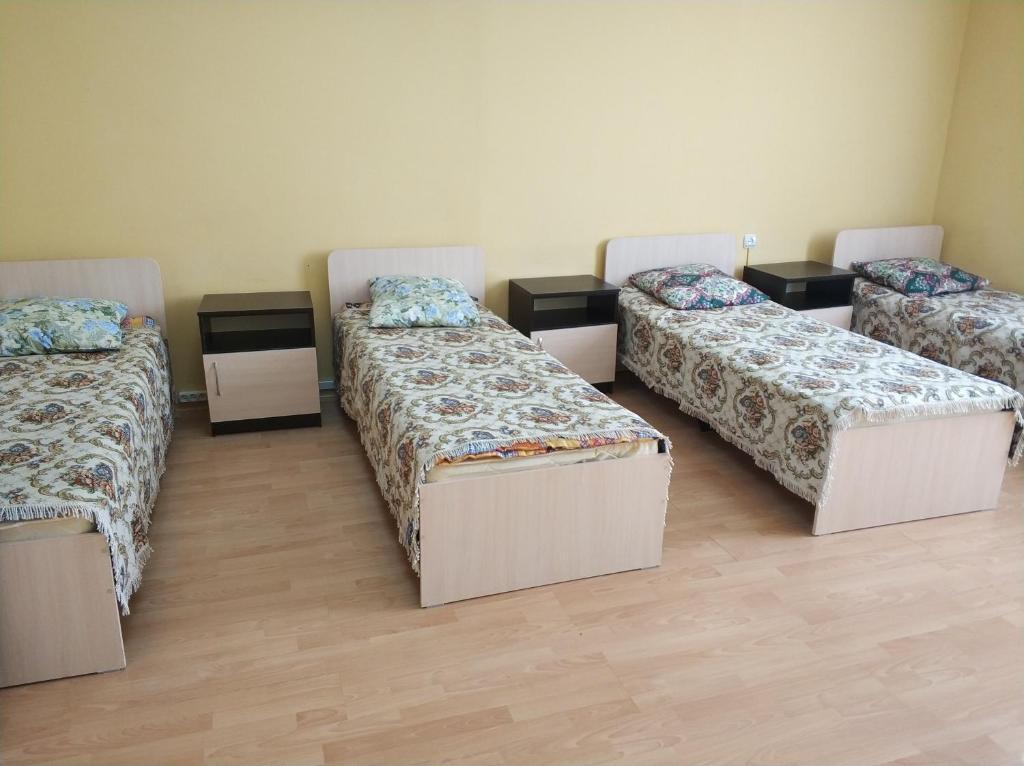 Кровать в общем номере в Әлем