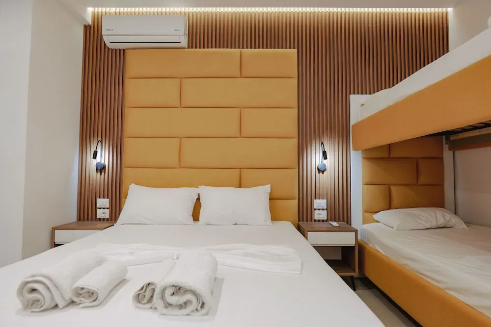 Deluxe Quadruple room with balcony
