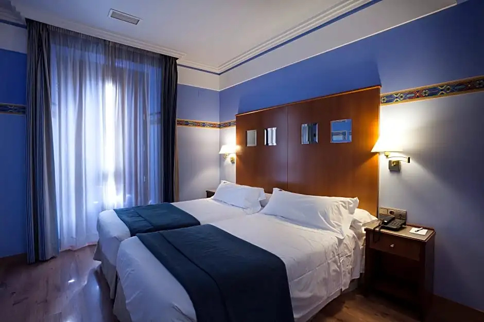 Suites Gran Via 44 Apartahotel - Chambres
