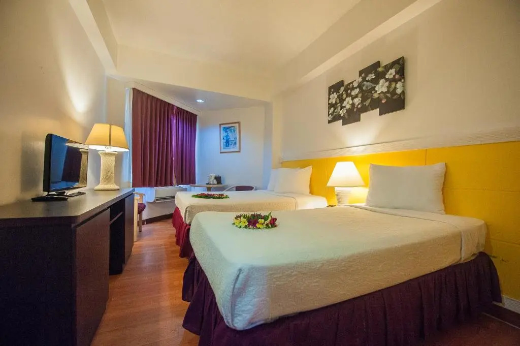 Grand Plaza Hotel - Chambres