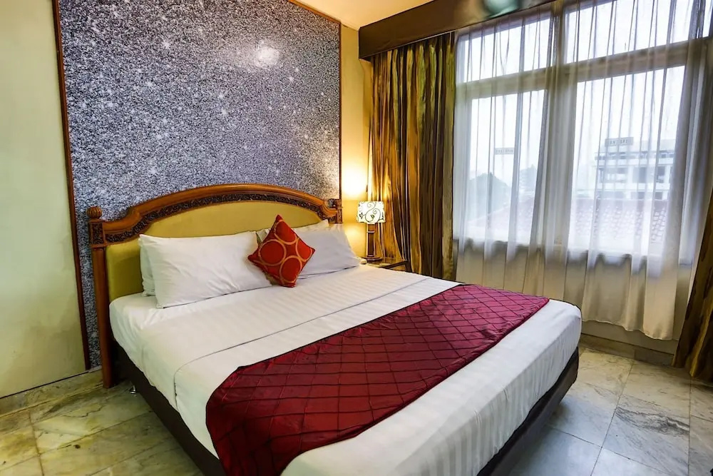 Johns Pardede International Hotel - Chambres