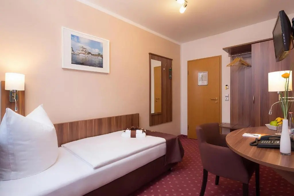 Gold Hotel - Chambres