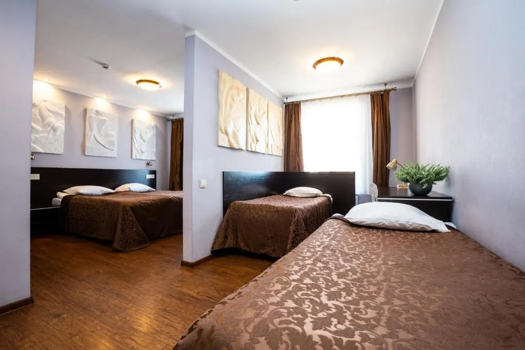 Primo Hotel - Chambres