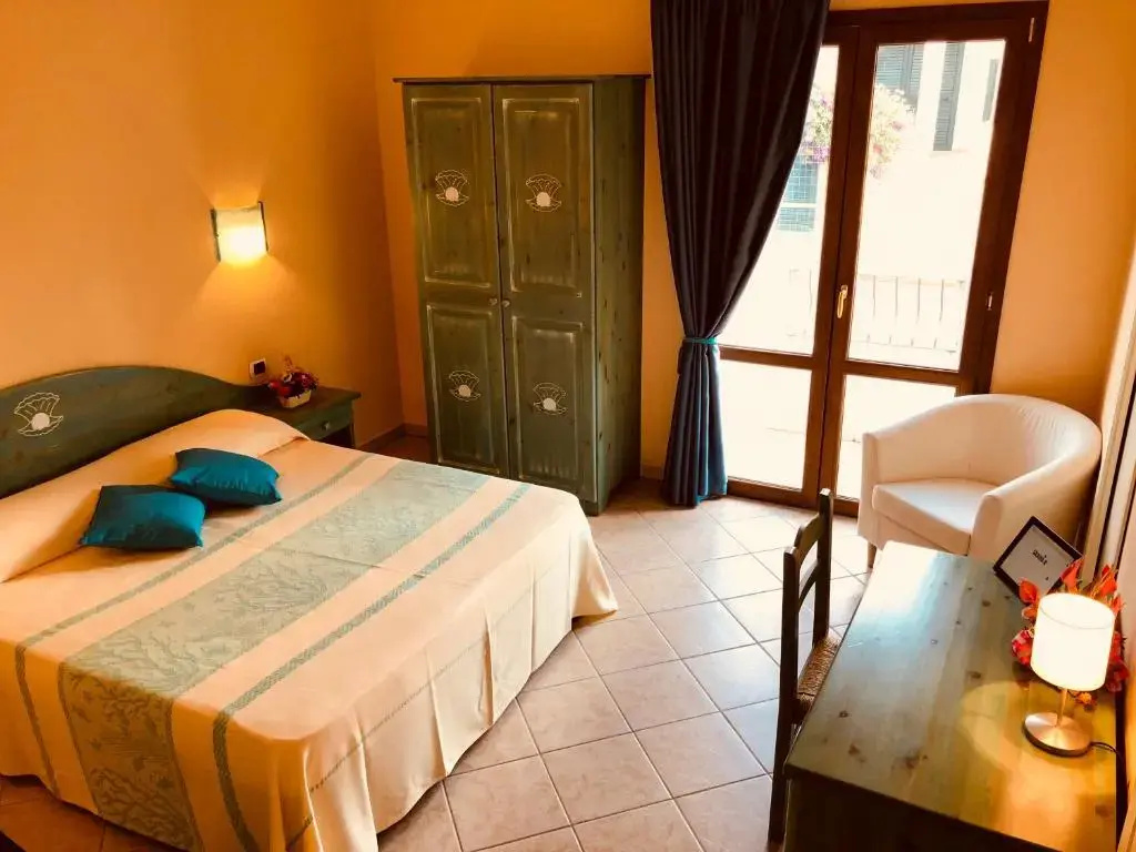 La Perla Hotel - Chambres