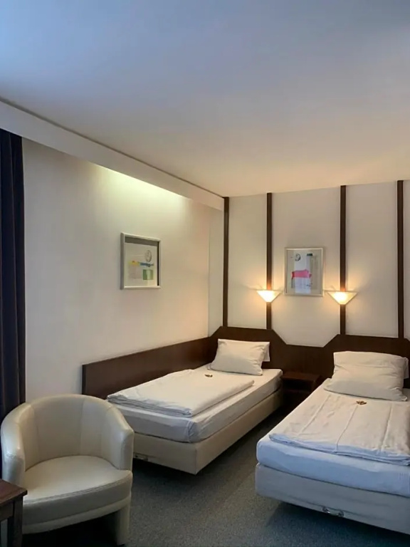 Hotel Mondial Comfort - Chambres