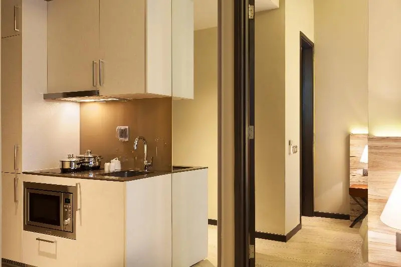 Louis Kienne Serviced Residences - Chambres