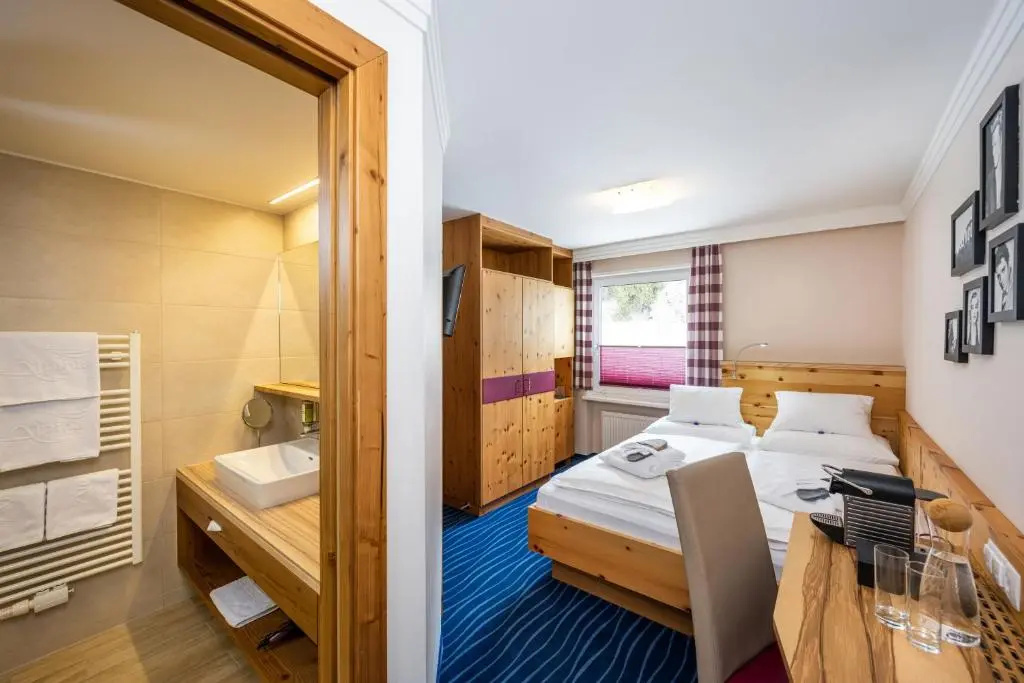 Hotel Alpina - Chambres
