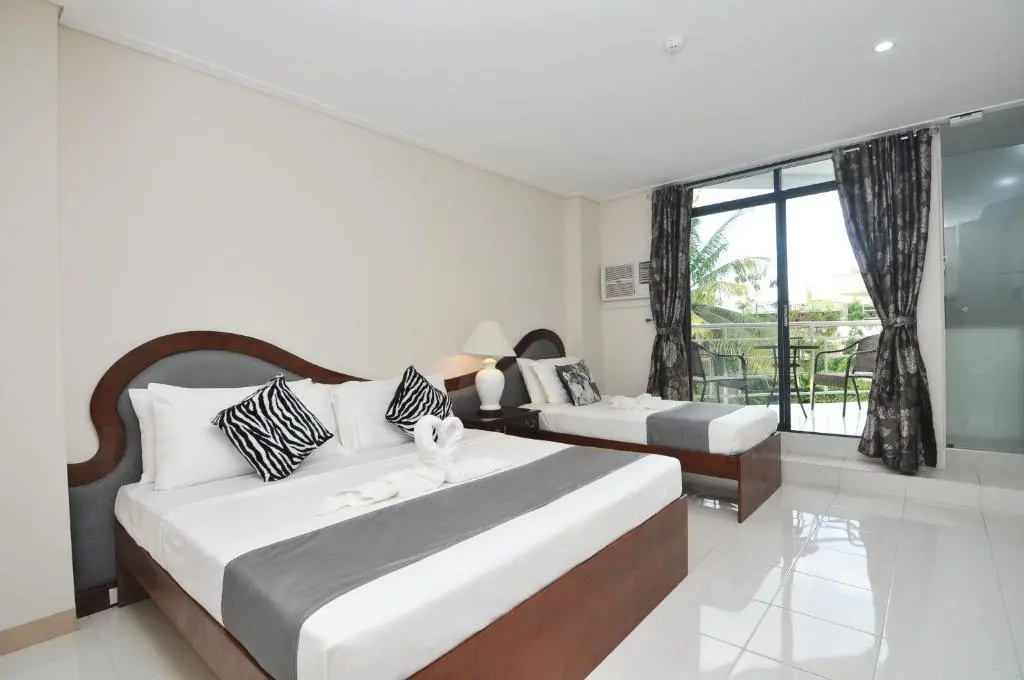 717 Cesar Place Hotel - Chambres