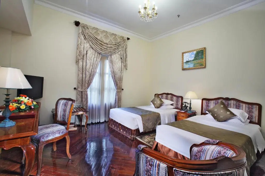 Hotel Grand Saigon - Chambres