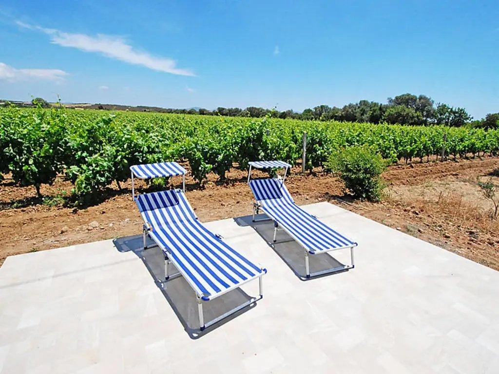 2 bedrooms house with enclosed garden and wifi at Is Potettus