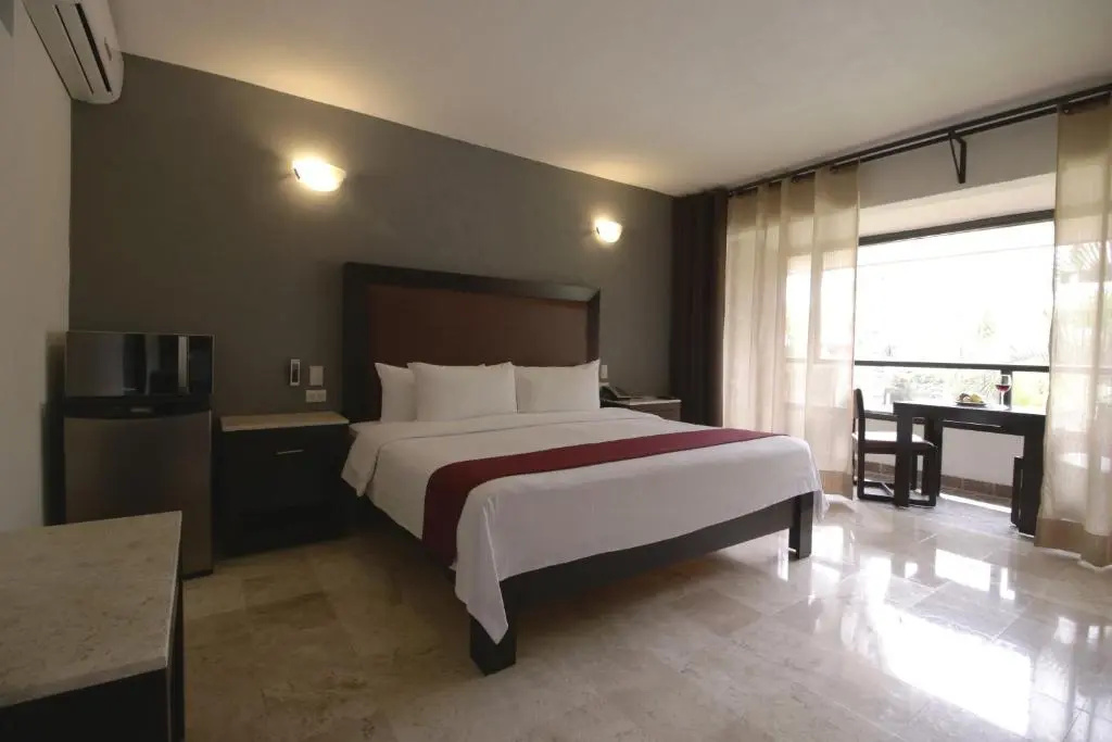 Real de Minas Poliforum - Chambres