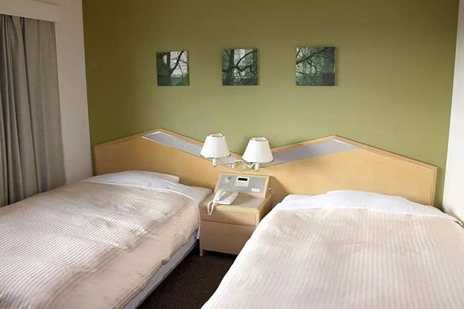Shin Osaka Washington Hotel Plaza - Chambres