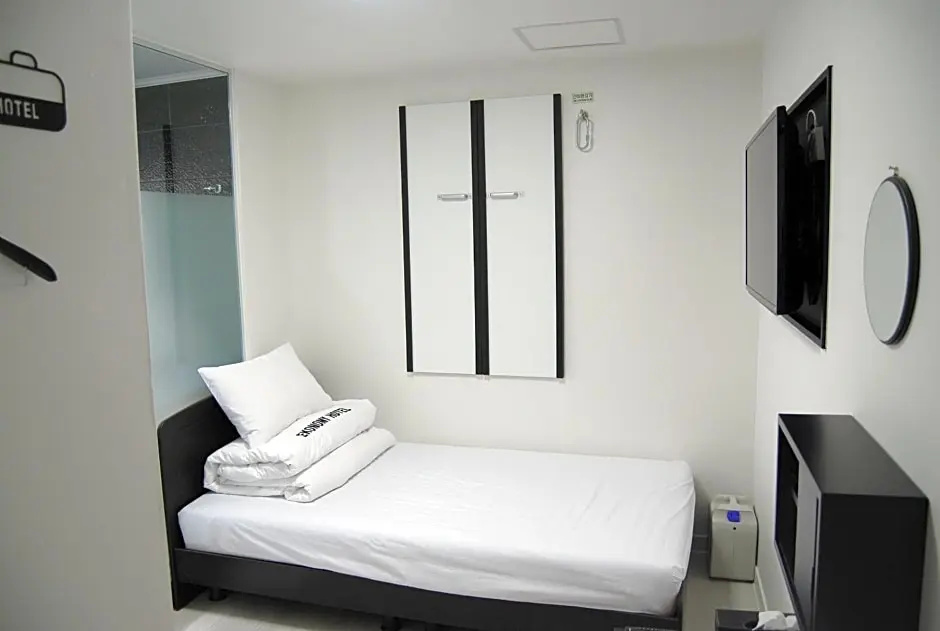 Ekonomy Hotel Nampo - Chambres