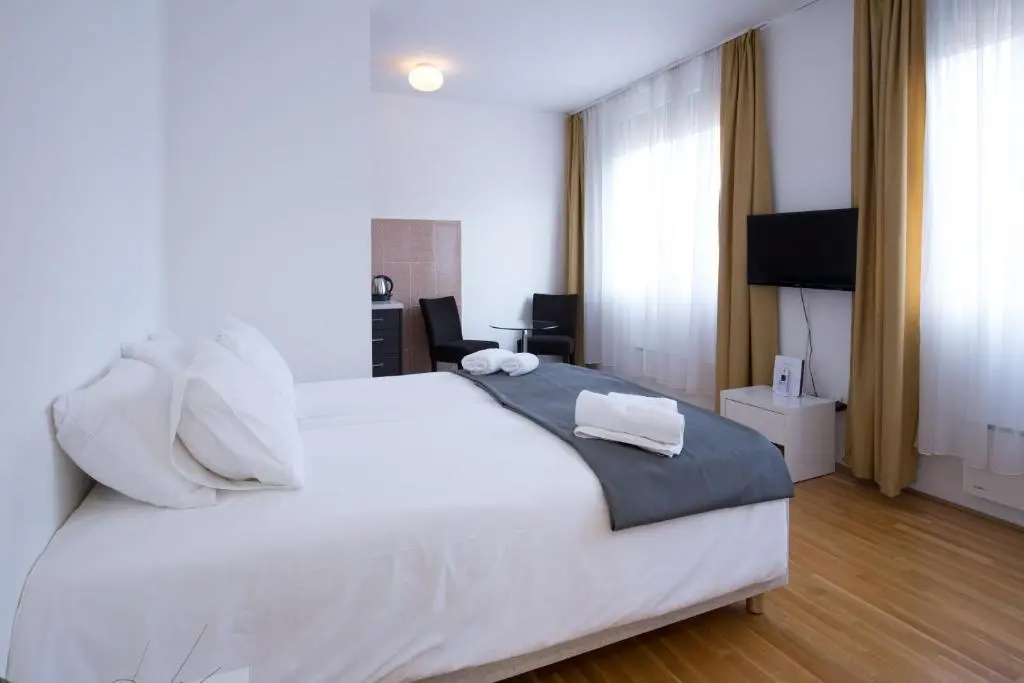Nova City Hotel Signature Collection - Chambres