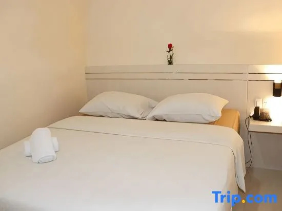 Griya Hotel - Chambres
