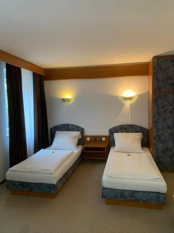 Hotel Mondial Comfort - Chambres