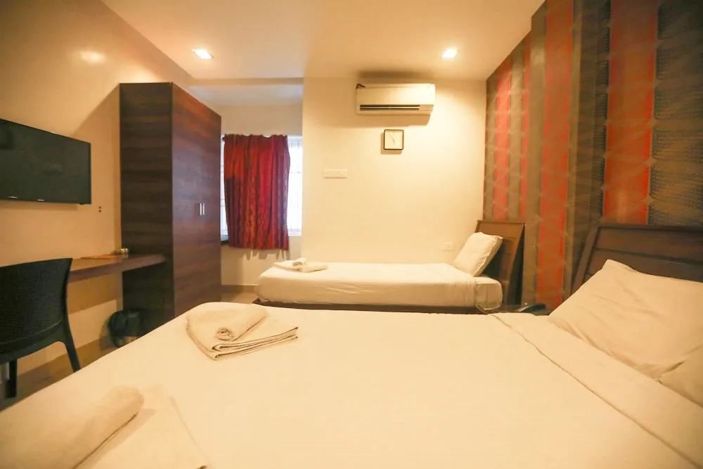 ULO Aravindar Residency - Chambres