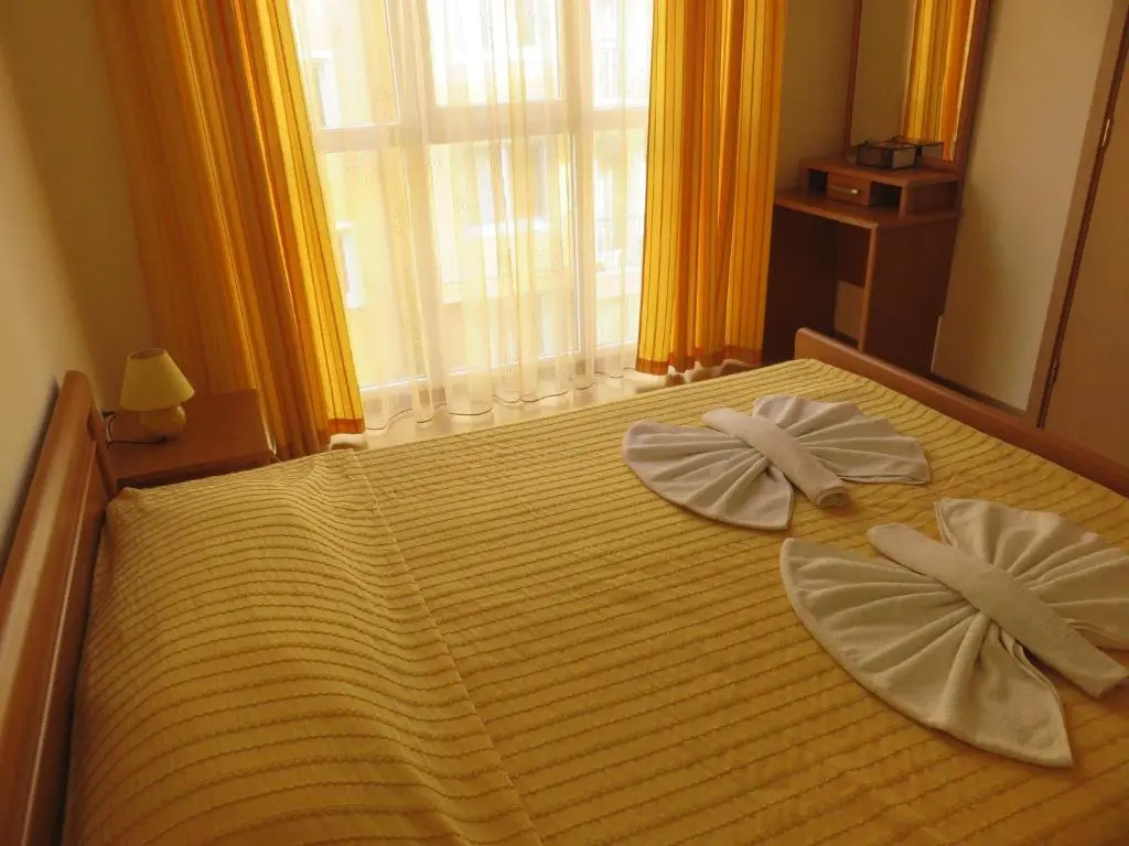 Aquaria Holiday Apartments - Chambres