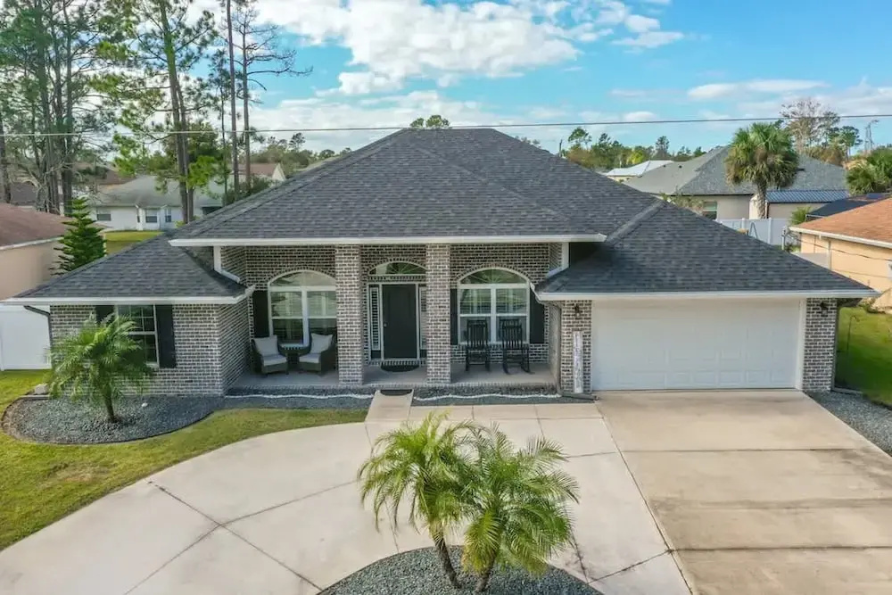 Modern 4BR Retreat Near Beach Heated Pool