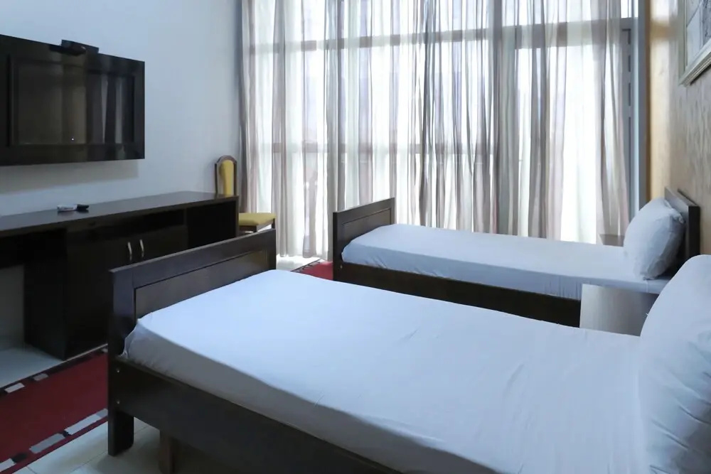 Hotel Gjuta - Chambres
