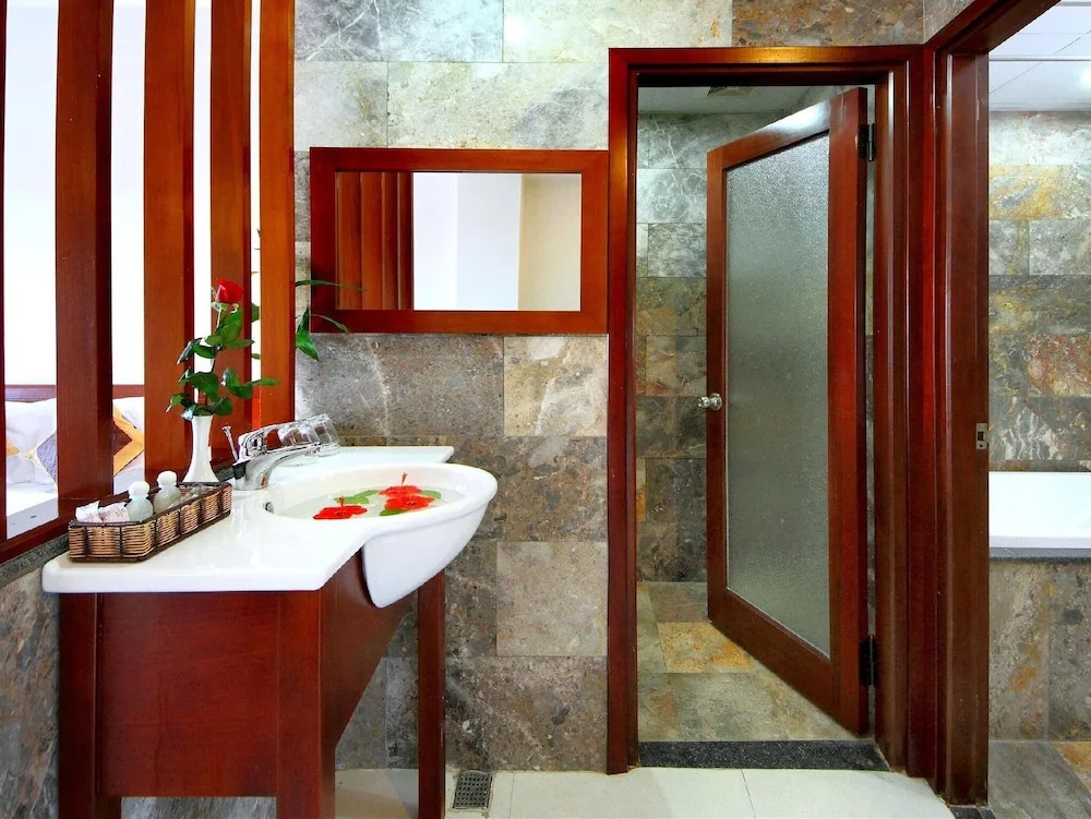 Deluxe Quadruple room with balcony