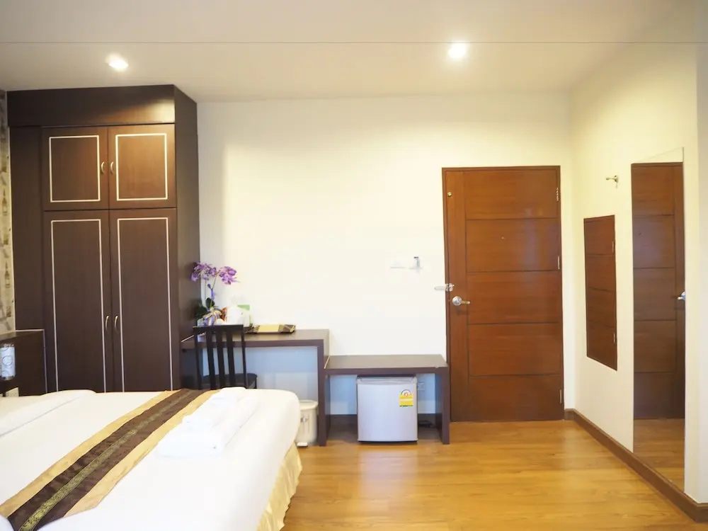 Suksomboon Hotel - Chambres