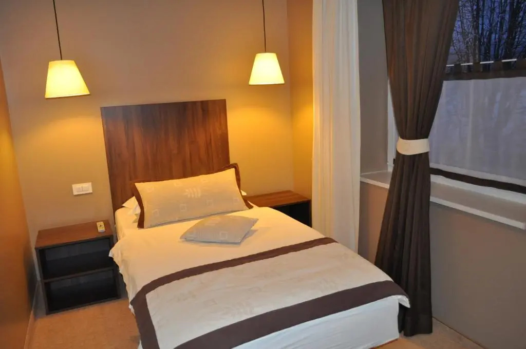 Ambient Hotel - Chambres