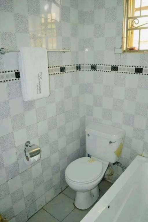 De Lawrence Court & Suites - Chambres