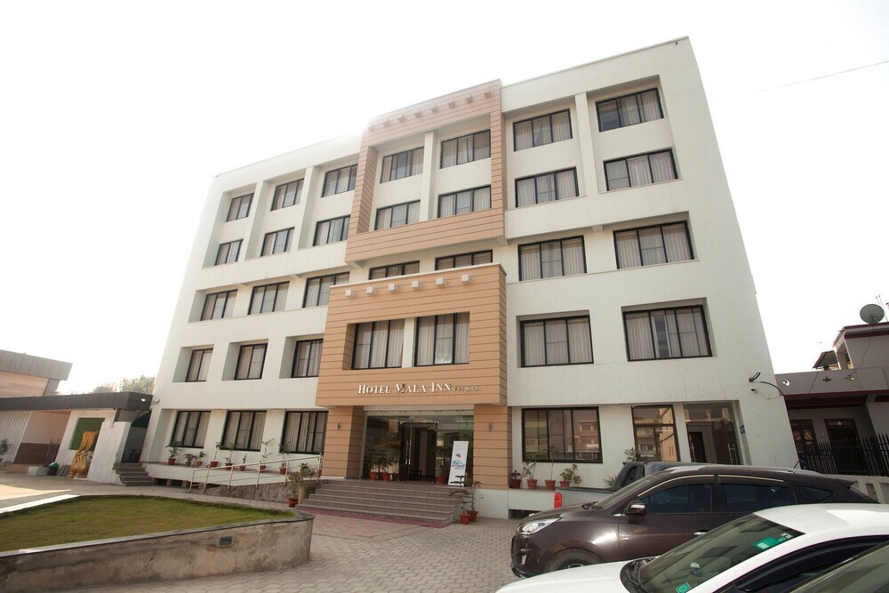 Отель Capital O 686 Hotel Mala Inn в Данг