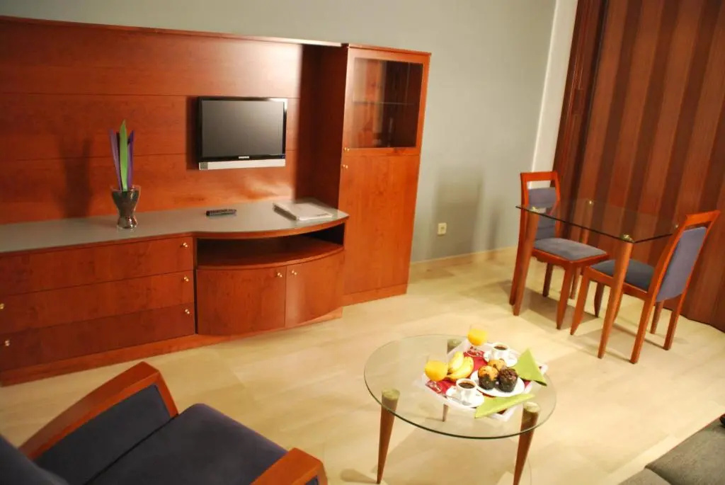 Aparthotel Napols - Chambres
