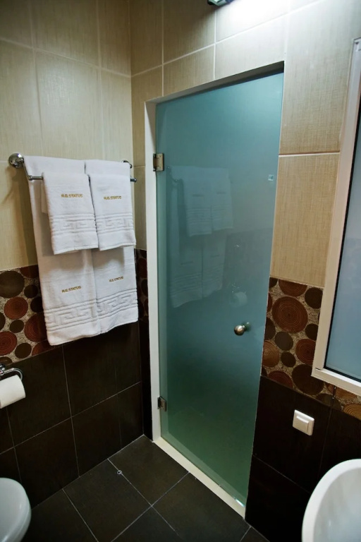 RG Status Hotel - Chambres
