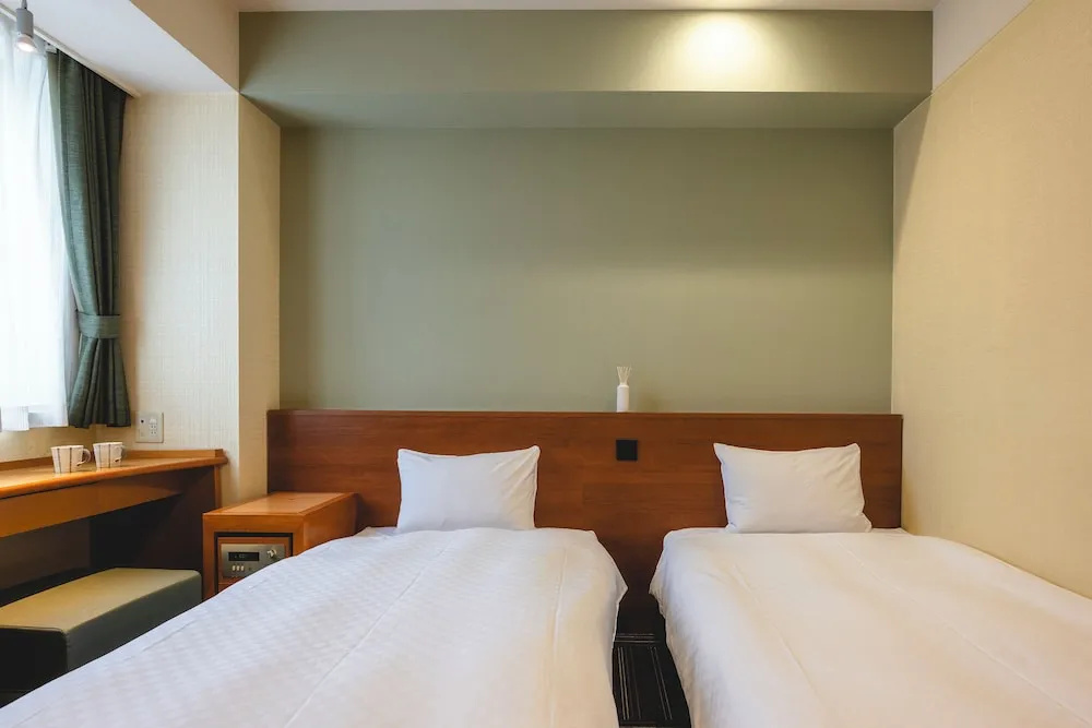 Kanku Izumiotsu Washington Hotel - Chambres