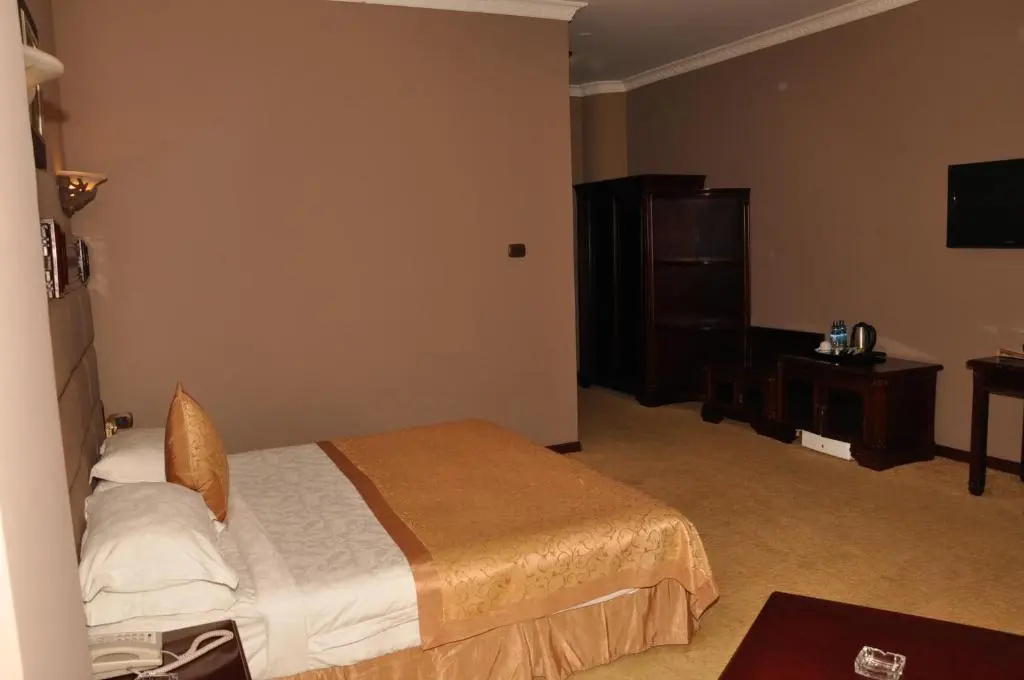 Friendship International Hotel - Chambres