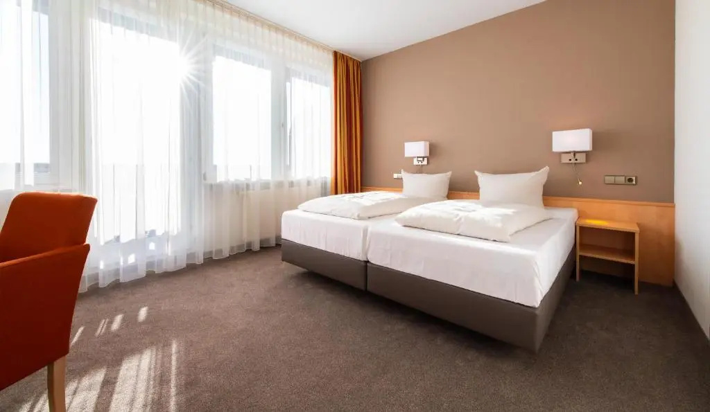 ARAMIS Tagungs- und Sporthotel - Chambres