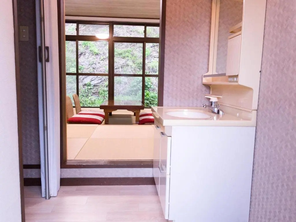 Hotel Caretta Amami - Chambres