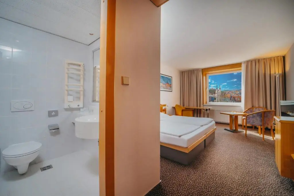 Cosmopolitan Bobycentrum - Chambres