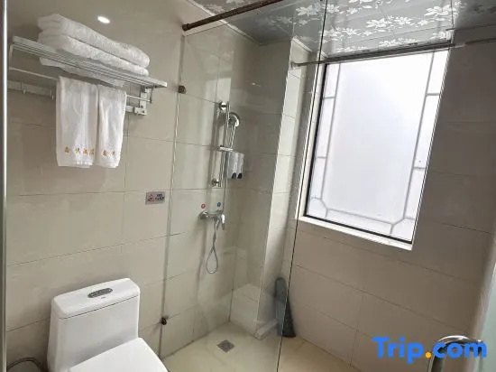 Huajun Hotel - Chambres