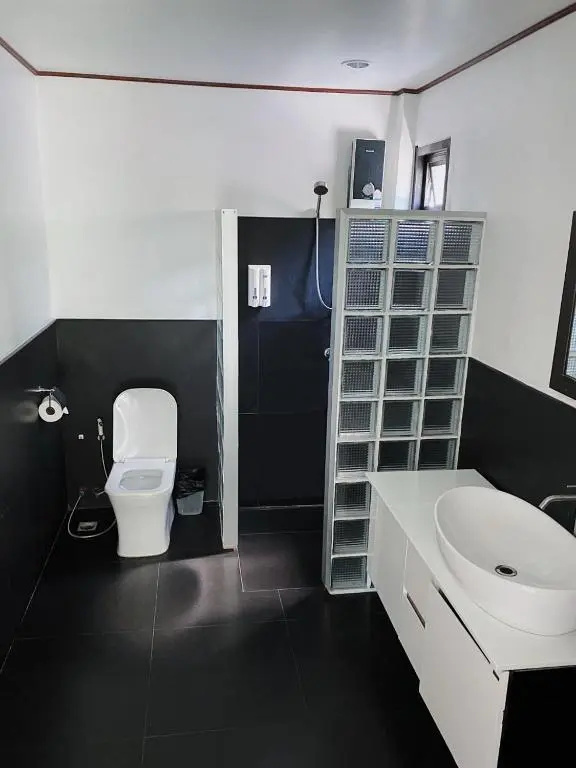 The Reef Hotel & Studios - Chambres