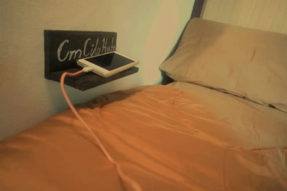 Кровать в общем номере в CM City Hostel
