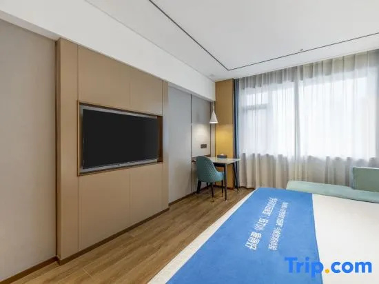 Xinyue Hotel - Chambres