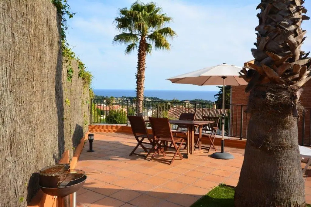 4 bedrooms house with sea view enclosed garden and wifi at Lloret de Mar 1 km away from the beach