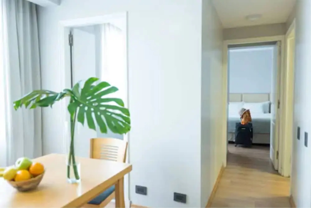Portal Plaza Suites - Chambres
