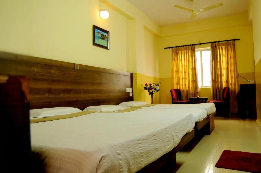 Suvarna Residency - Chambres