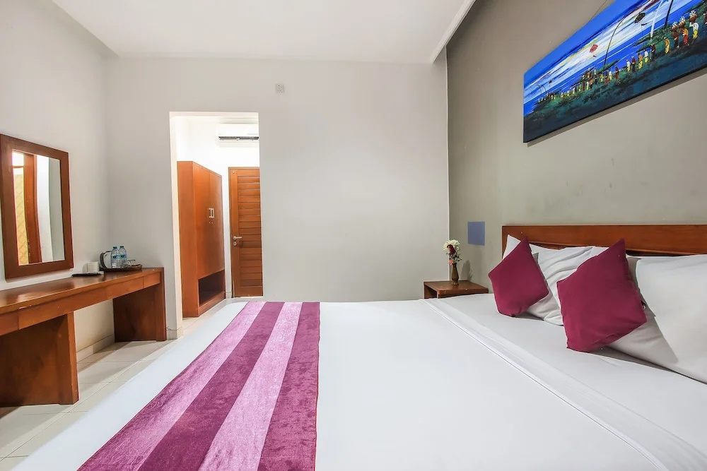 D'gaduh Suite Kuta - Chambres