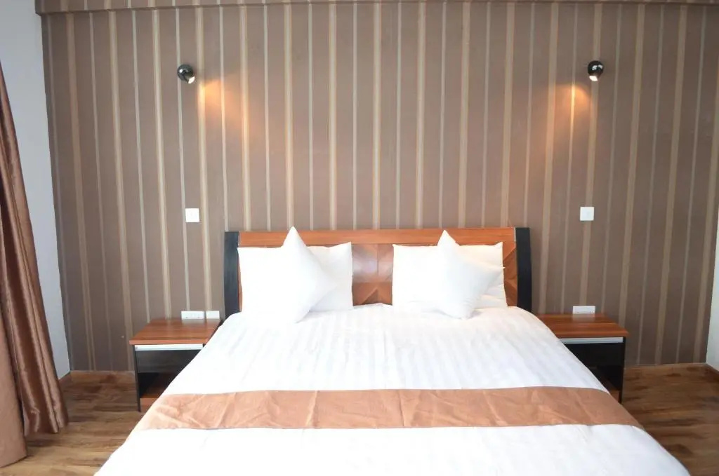 WE Hotel and Suites - Chambres