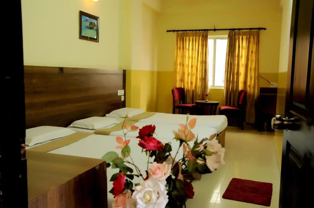 Suvarna Residency - Chambres